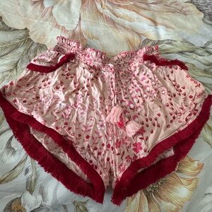 Poupette St. Barth Pink Floral Kids Shorts with Red Fringe